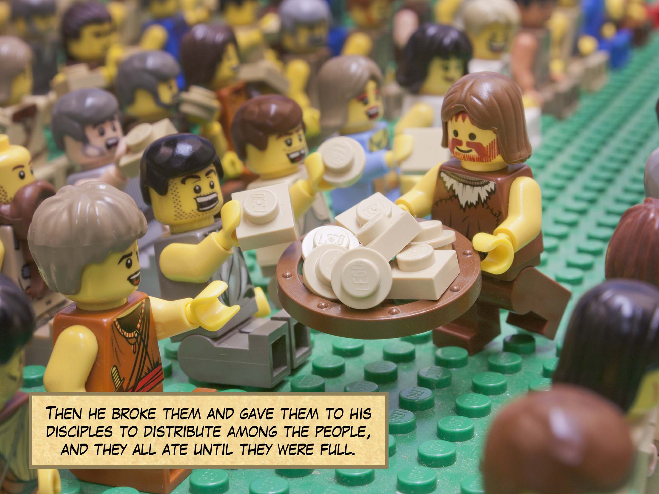 He divided the two fish among them all.