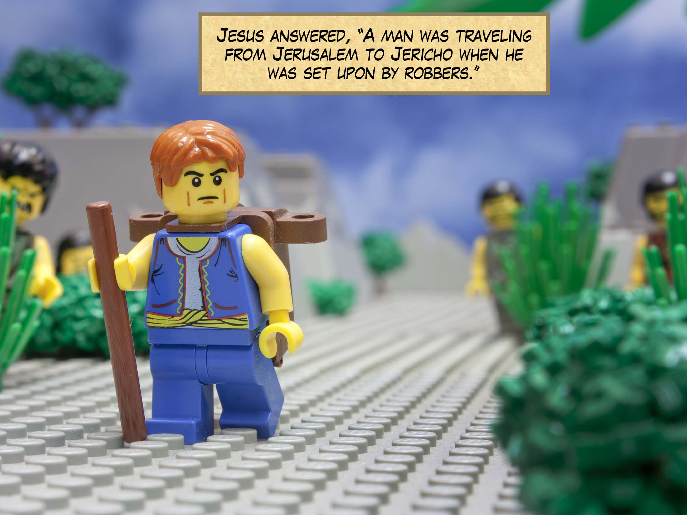 Jesus answered, 'A man was traveling from Jerusalem to Jericho when he was set upon by robbers.'<br>