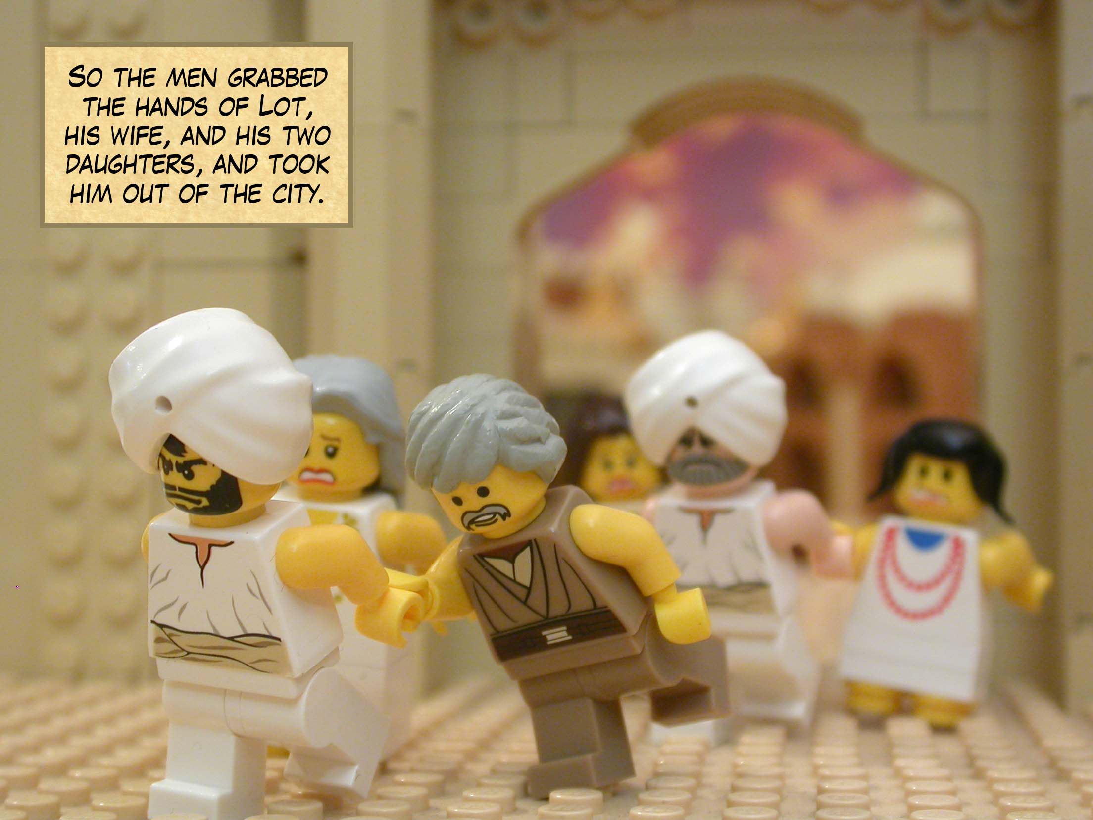 So the men grabbed the hands of Lot, his wife, and his two daughters, and took him out of the city.
