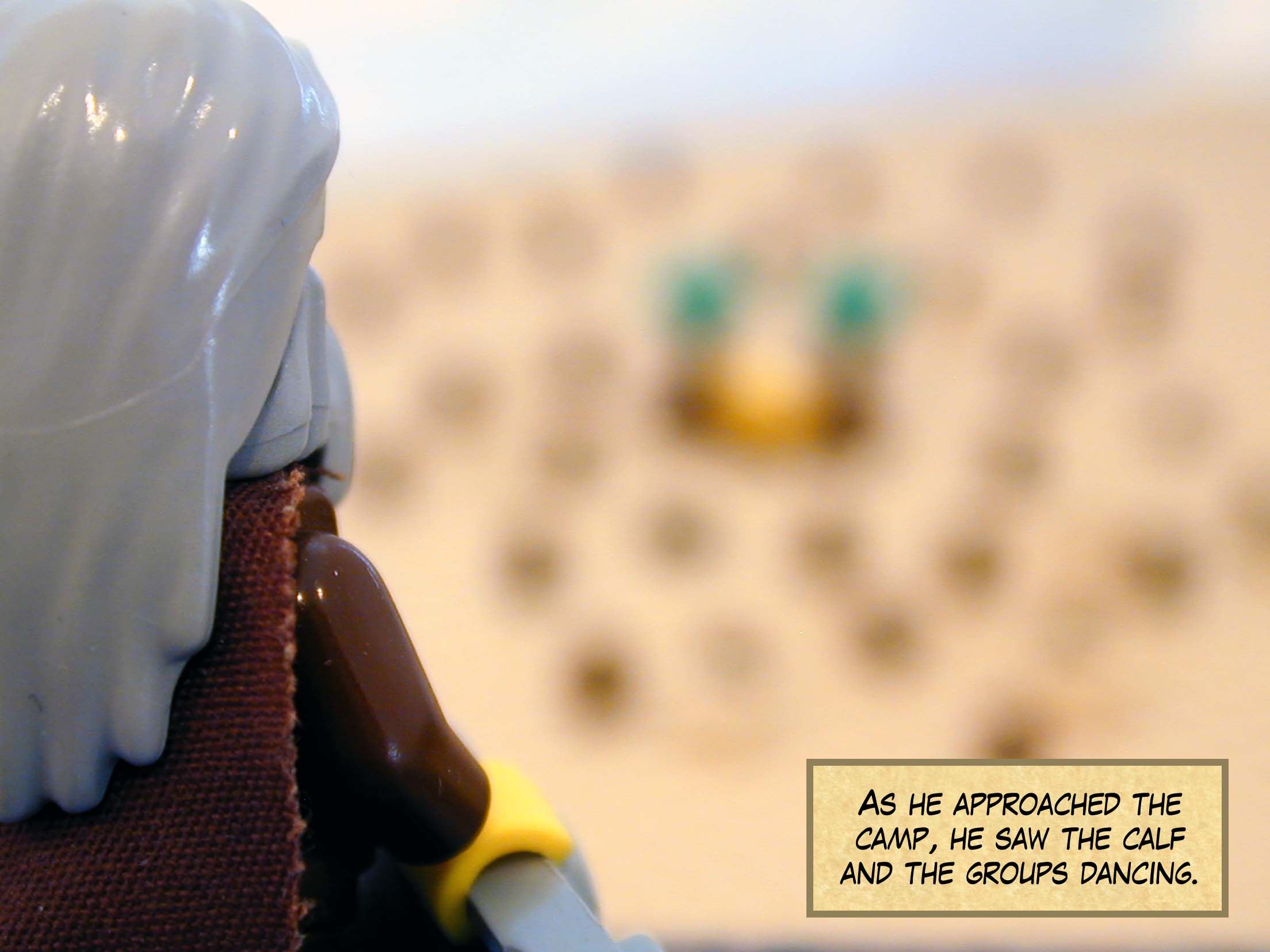 As he approached the camp, he saw the calf and the groups dancing.